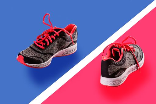A sport boots isolated on a red and blue background