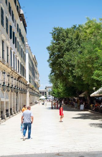 A vertical shot of the Liston building on a sunny day in Corfu, France