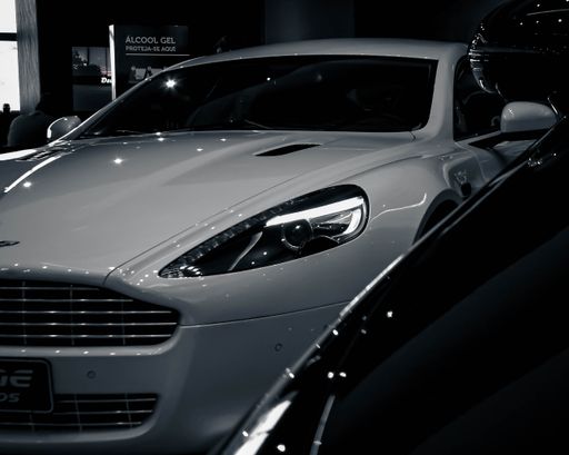 An Aston Martin Rapide 2011 - front view, cinematic shot