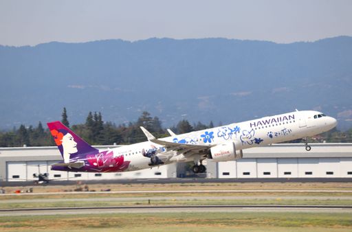 Hawaiian Airlines Airbus A321 neo in Lilo and Stitch livery taking off from San Jose international airport with Santa Cruz mountains in the background