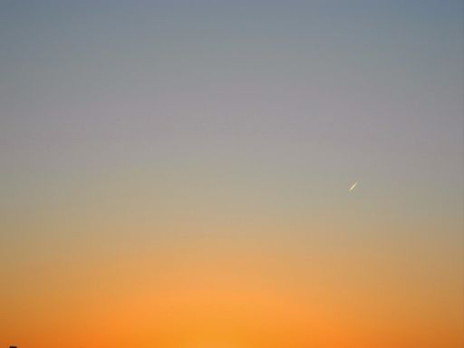 A tranquil background of blue and orange gradient sky