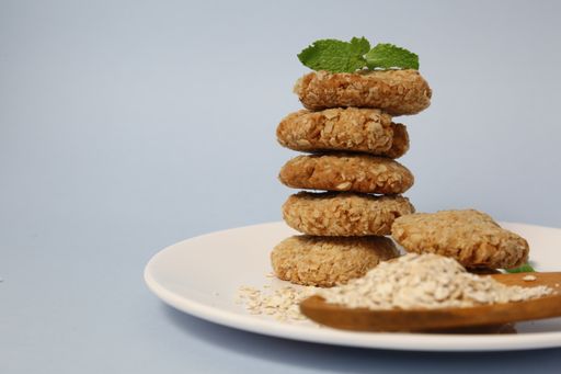 A stack of homemade healthy oatcakes on a white plate