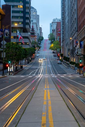 A vertical shot of an empty street in San Francisco, CA in the early morning