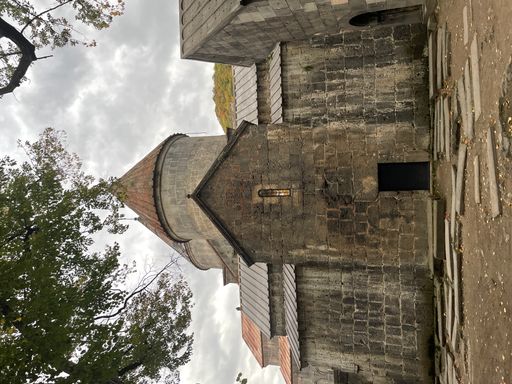 A vertical shot of the Sanahin Monastery under a cloudy sky in Lori, Armenia