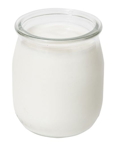 Yogurt glass jar isolated on white background.