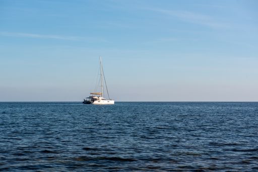 Sailboat off the coast of Formentera in the Mediterranean in Spain.