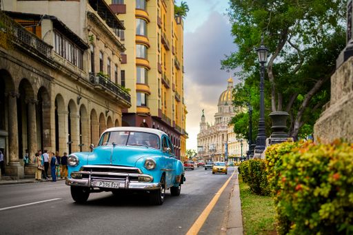 An old vintage, classic blue car at the street of Havana, Cuba