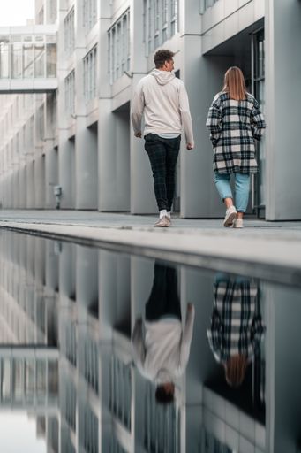 A beautiful shot of people walking on a modern pedestrian zone in Munich, Germany
