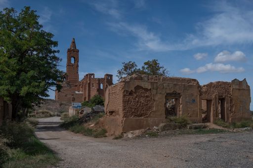 The abandoned destroyed building against a cloudy sky in the old city of Belchite in Spain