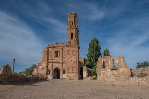 The old shattered church of San Agustin against a cloudy sky in the city of Belchite in Spain