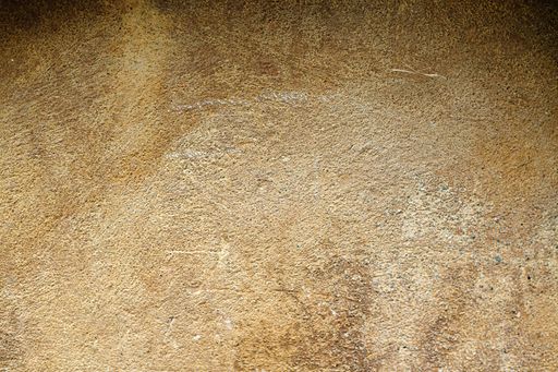 Background of orange stone wall texture horizontal photo. Stone pattern, textures and backgrounds.