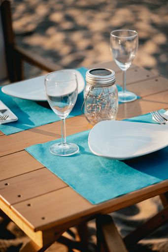 A vertical shot of a table for two