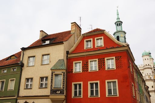 Poznan, Poland, a low angle shot of the city hall and the colored houses of the old market