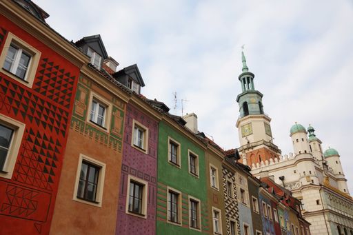Poznan, Poland, a low angle shot of the city hall and the colored houses of the old market