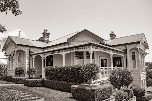View of white wooden colonial villa in Remuera. Vintage look. Auckland, New Zealand - December 4 2019