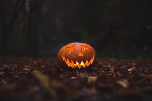 Scary halloween pumpkin face in the dark.