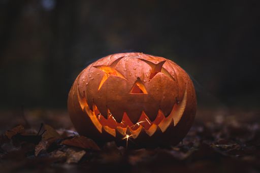 Scary halloween pumpkin face in the dark.