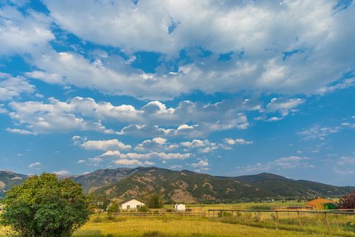 A beautiful landscape with fields, mountains, and a beautiful sky, Bozeman, Montana