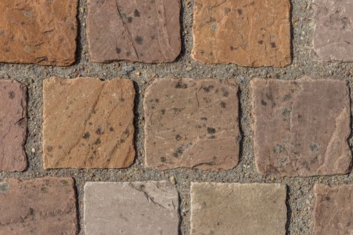 A closeup shot of an old stone wall texture
