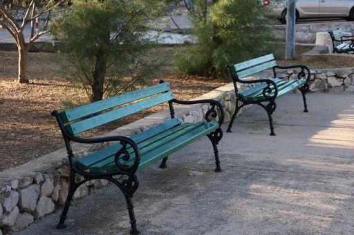 Benches in the park. Wooden bench for rest.