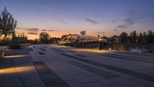 A beautiful view of the Peace Bridge over the river captured in Calgary, Canada