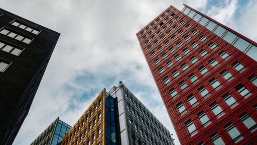 View of London skyscrapers under a cloudy sky