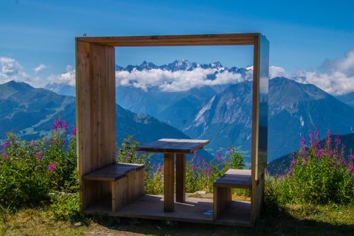 A beautiful landscape of the Alps in Switzerland in summer with a picnic area in verbiers in Valais