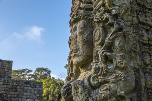 A beautiful shot of the ancient stone carvings of Mayan ruins in Copan Ruinas, Honduras
