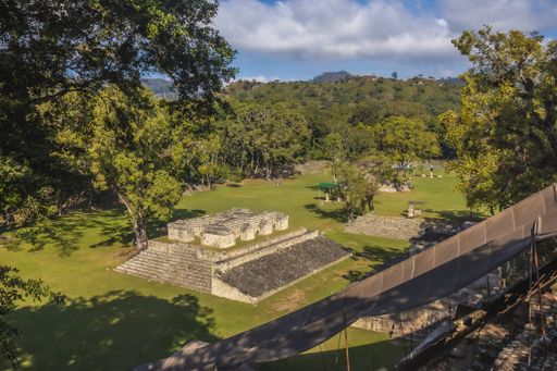 The Mayan ruins of Honduras surrounded by trees