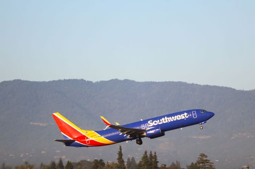 The Southwest Airlines Boeing 737-800 taking off from San Jose Airport.