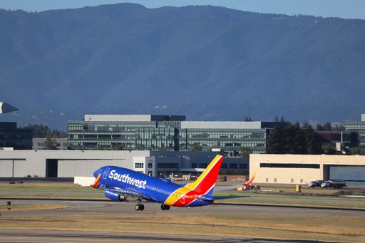 The Southwest Airlines Boeing 737-700 taking off from San Jose International Airport.