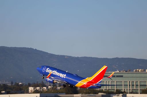 The Southwest Airlines Boeing 737-700 taking off from San Jose International Airport.