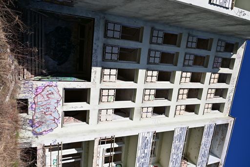 A vertical shot of an old damaged building in Buckow, Germany, Lost-Place