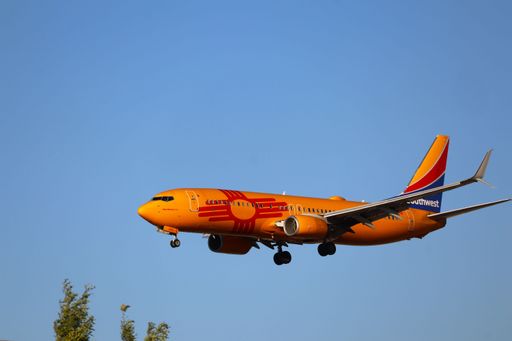 Southwest Airlines Boeing 737-800 arrives at San Jose airport at sunset