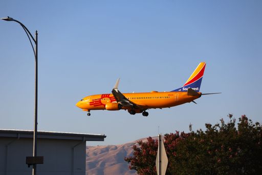 Southwest Airlines Boeing 737-800 arrives at San Jose airport at sunset