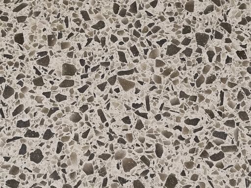 A closeup shot of a wall with small pebbles