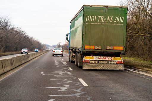 A heavy duty truck in traffic in Bucharest, Romania