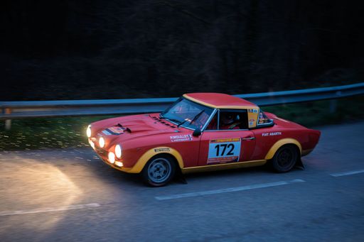 Fiat 124 Abarth Rally 172 races through the rainy night in the 73rd Rally KH7 Costa Brava 2025
