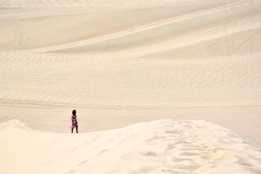 silhouette of a woman in the desert in central Peru