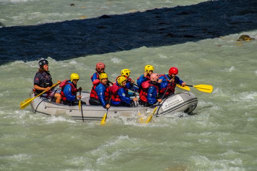 A group of people canyoning on Dora Baltea in Val Aoste, Italy