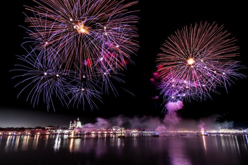 A beautiful view of colorful fireworks during the Redentore Festival in Venice, Italy