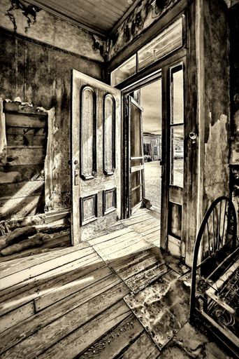 A sepia tone of an old abandoned house at Bodie State Historic Park in California