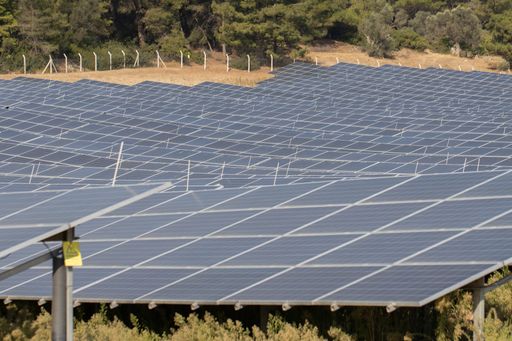 A high angle shot ofsolar panels, which use sunlight as a source of energy to generate direct current electricity