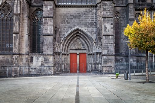 A gothic cathedral in Clermont Ferrand in France, made from dark volcanic rocks