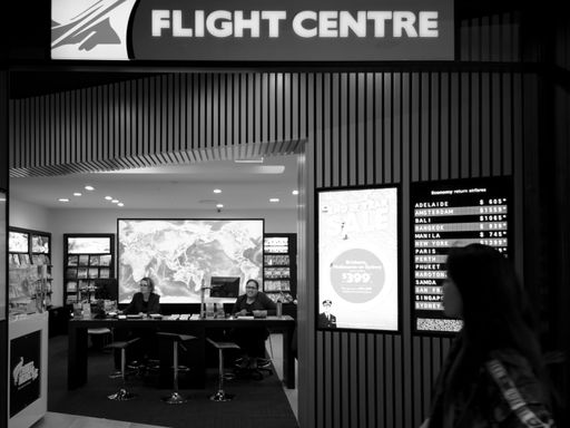 View of Flight Centre ticket and travel agency office in Westfield Newmarket Shopping Centre. Auckland, New Zealand - December 28 2019