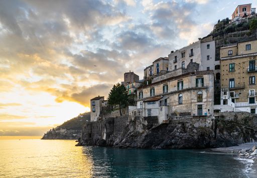 A beautiful scenic sunset over Amalfi Coast viewed from the town of Minori, Campania, Italy