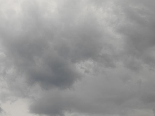 The view of the cloudy sky with gray rain clouds