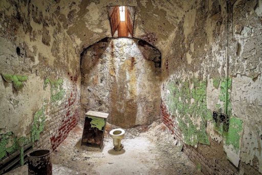 An interior shot of a prison cell at the Eastern State Penitentiary in Philadelphia, Pennsylvania