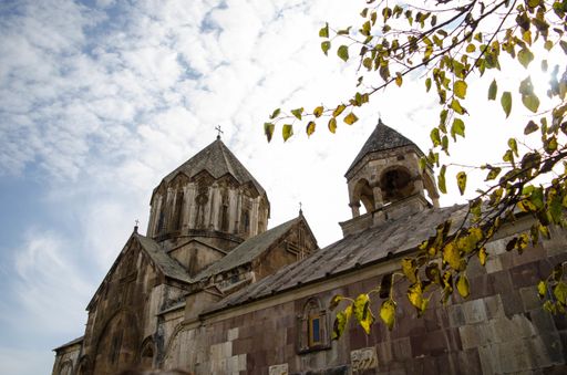 A low angle shot of an old church under a cloudy sky in Armenia