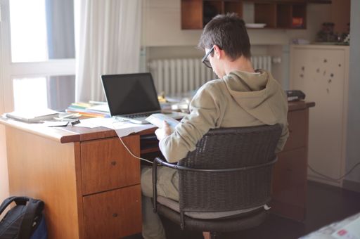 A young male working from home due to global pandemic
